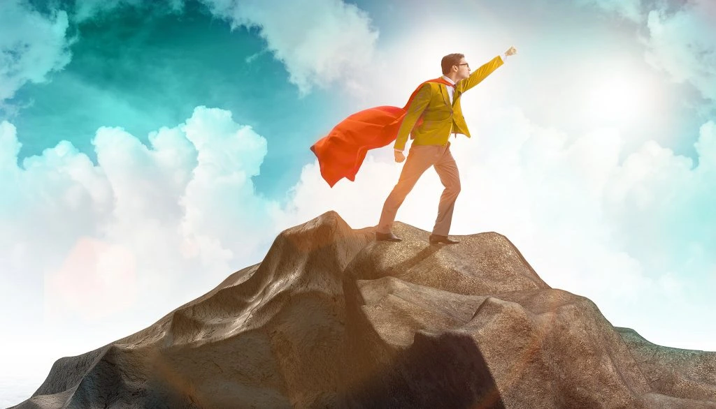 Superhero businessman on top of mountain atlanta seo company