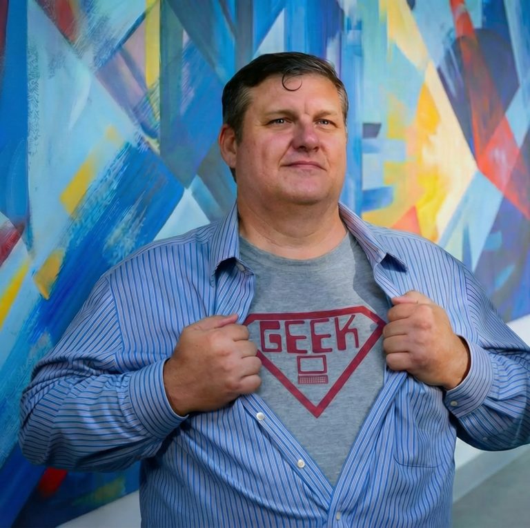 Bill Beers in front of mural